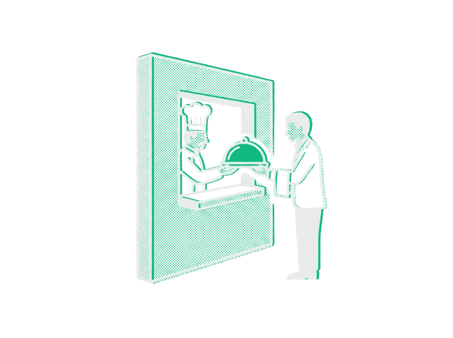 A chef passing an emerald covered dish through a serving hatch to a waiter on the other side of the wall