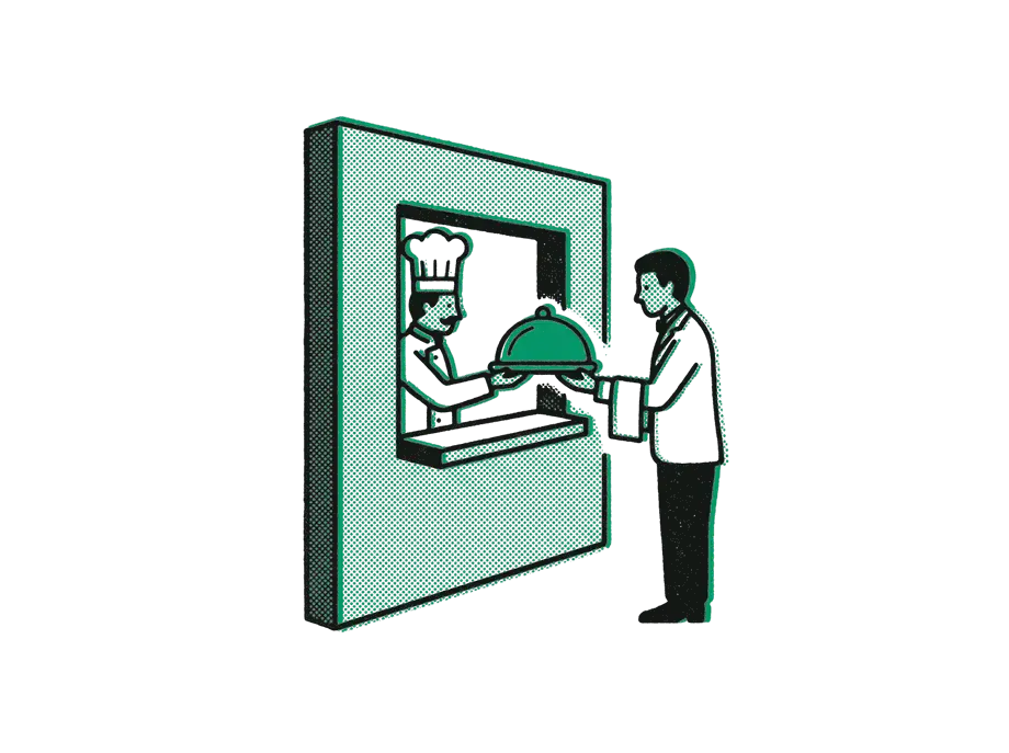 A chef passing an emerald covered dish through a serving hatch to a waiter on the other side of the wall