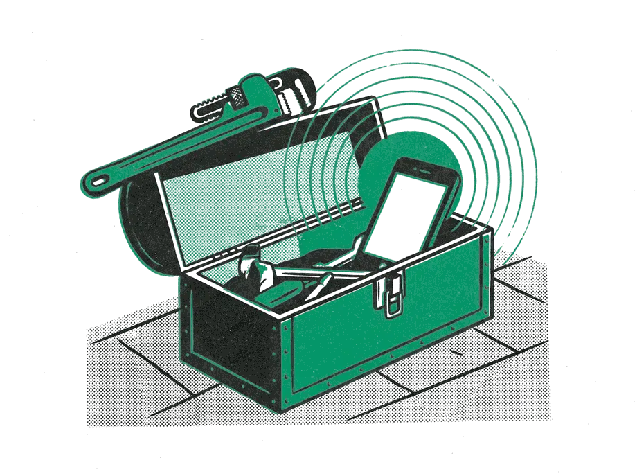 An open toolbox on a tiled floor, a pipe wrench across the lid and a phone inside lighting up emerald
