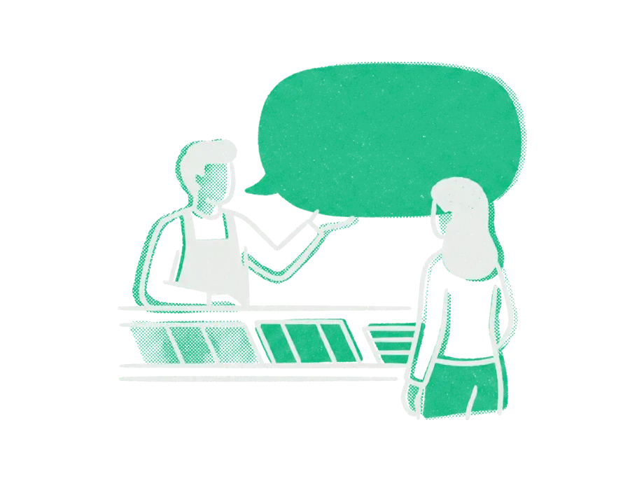 A shopkeeper in an apron handing a large emerald speech bubble across the counter to a customer